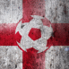 Angleterre : Ballon de foot sur mur grunge